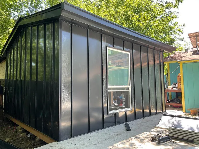 Black standing seam metal wall panels for Metal Roof Installation in Winton