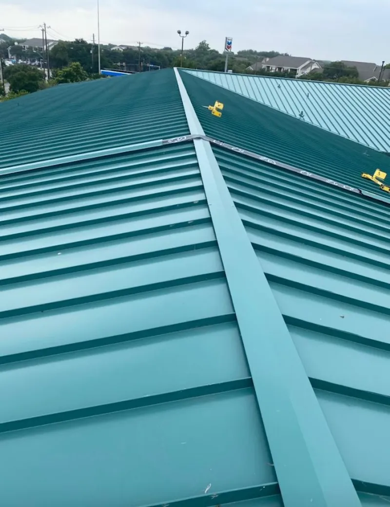 Green commercial metal roof ridge and valley for Metal Roof Repair in Winton
